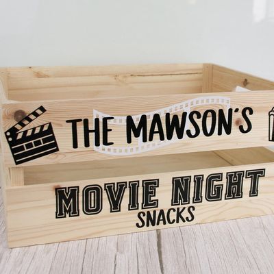 Wooden crate lettered “The Mawson’s Movie Night Snacks” with a film clapperboard