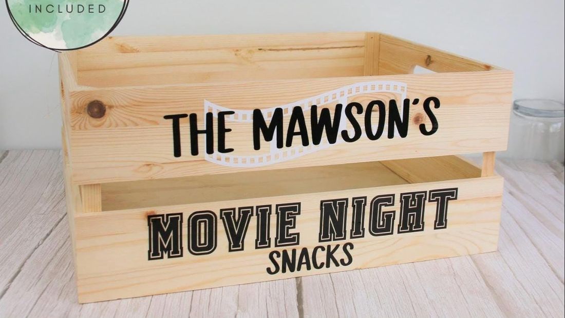 Decals reading “The Mawson’s Movie Night Snacks” on a wooden crate. Decal only, crate not included