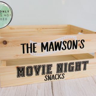 Close-up of the movie night decals on the front of a wooden crate. Decal only, crate not included