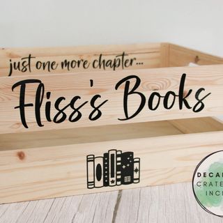 Close-up of “just one more chapter… Fliss’s Books” decals with a stack of books. Decal only, crate not included