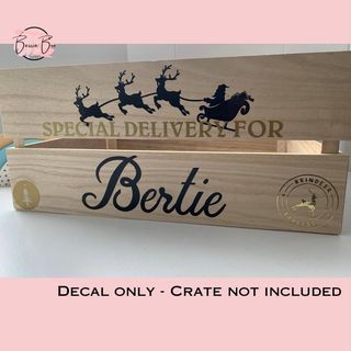 Decals reading “Special delivery for Bertie” with Santa’s sleigh on a crate. Decal only, crate not included