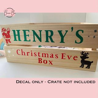 Decals reading “Henry’s Christmas Eve Box” with Santa and a reindeer. Decal only, crate not included